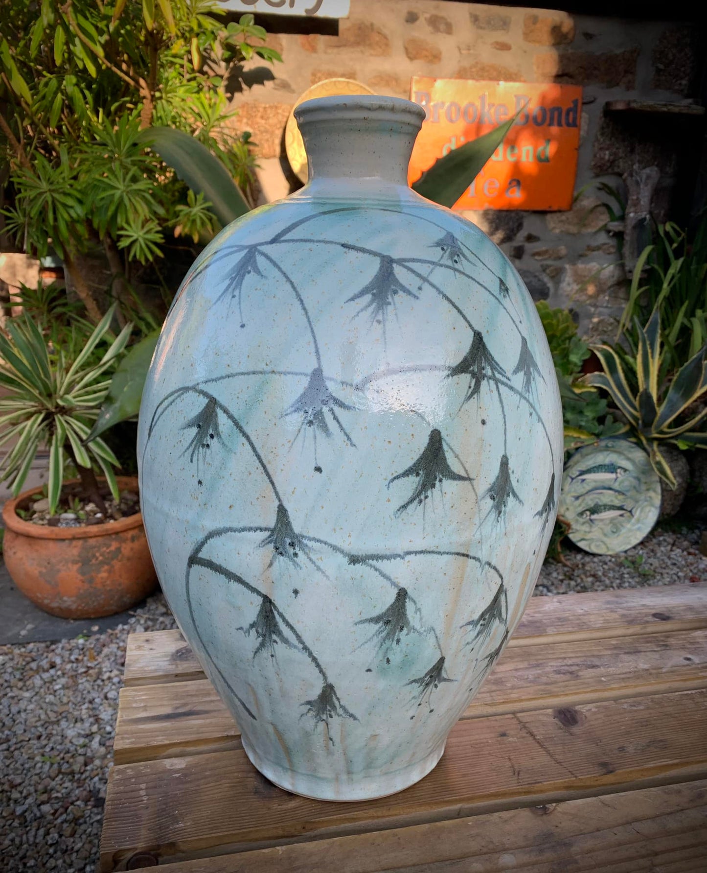 Very large stoneware bottle vase hand thrown & decorated with a Fuchsia motif