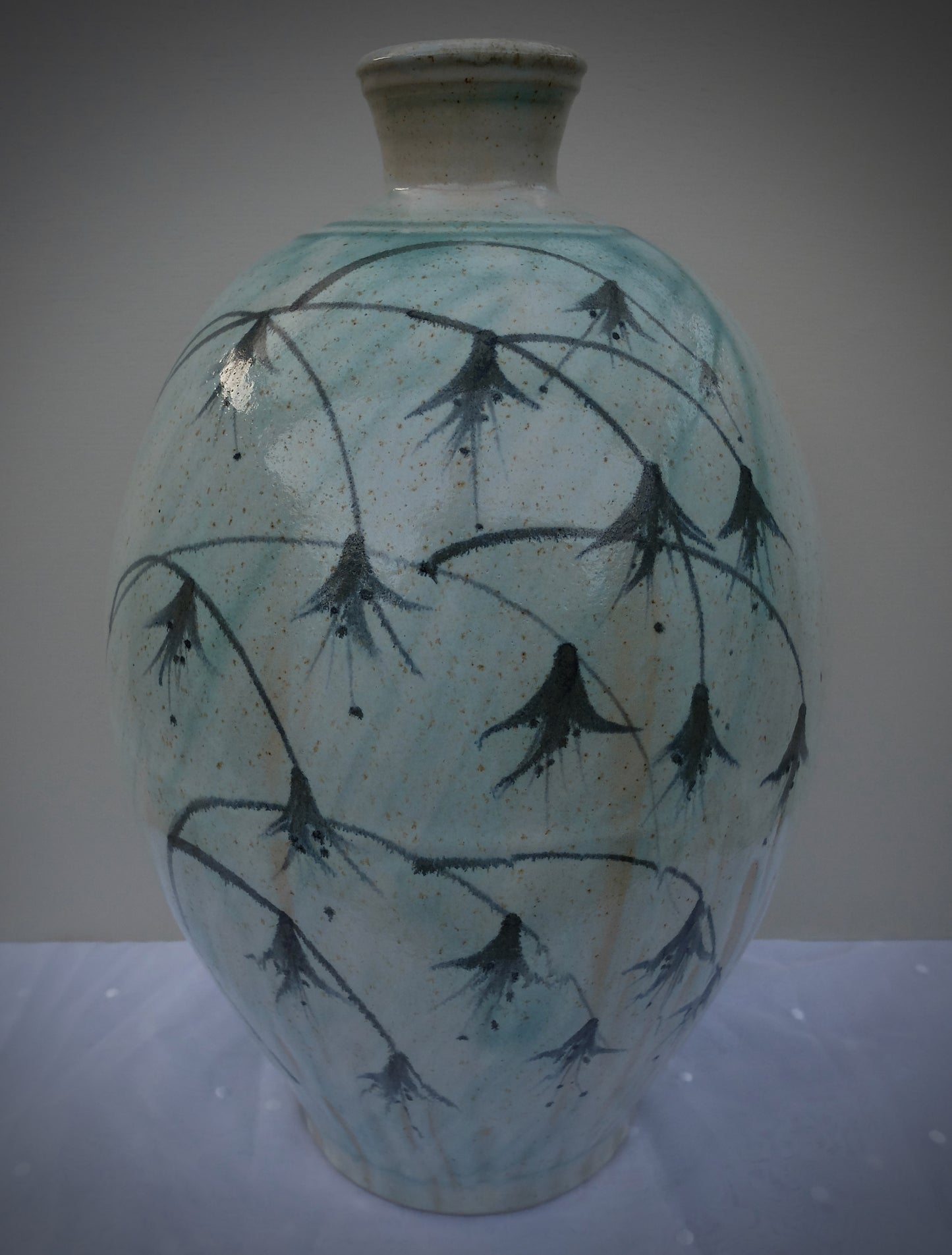 Very large stoneware bottle vase hand thrown & decorated with a Fuchsia motif
