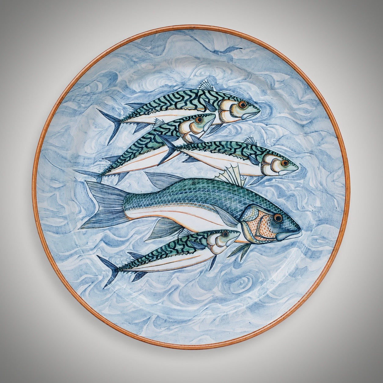 Large decorated pottery charger
