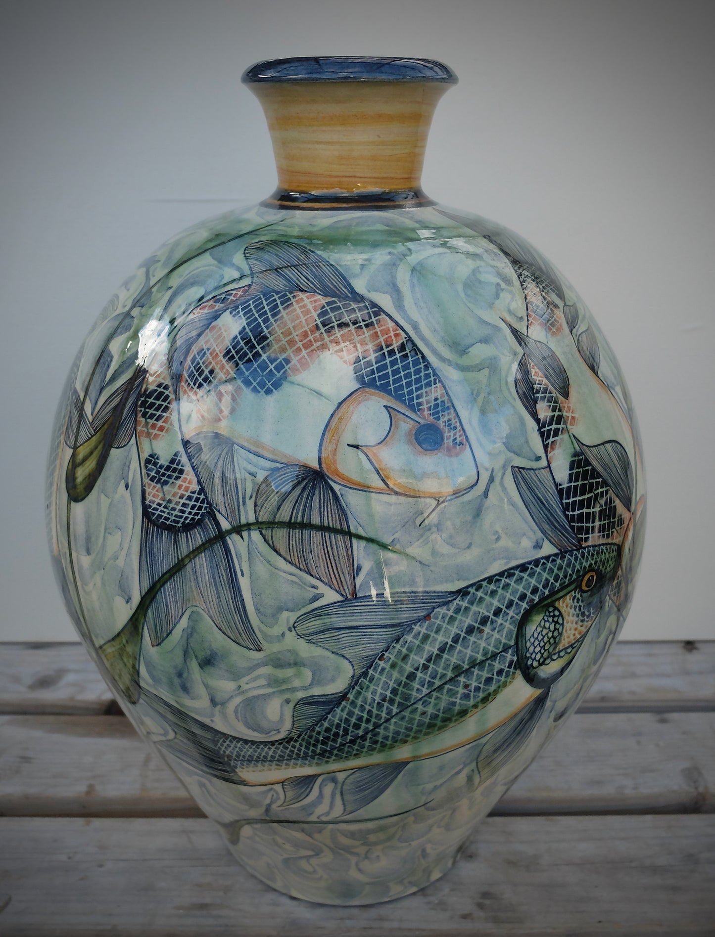 Very large bottle vase, fish decorated ceramics