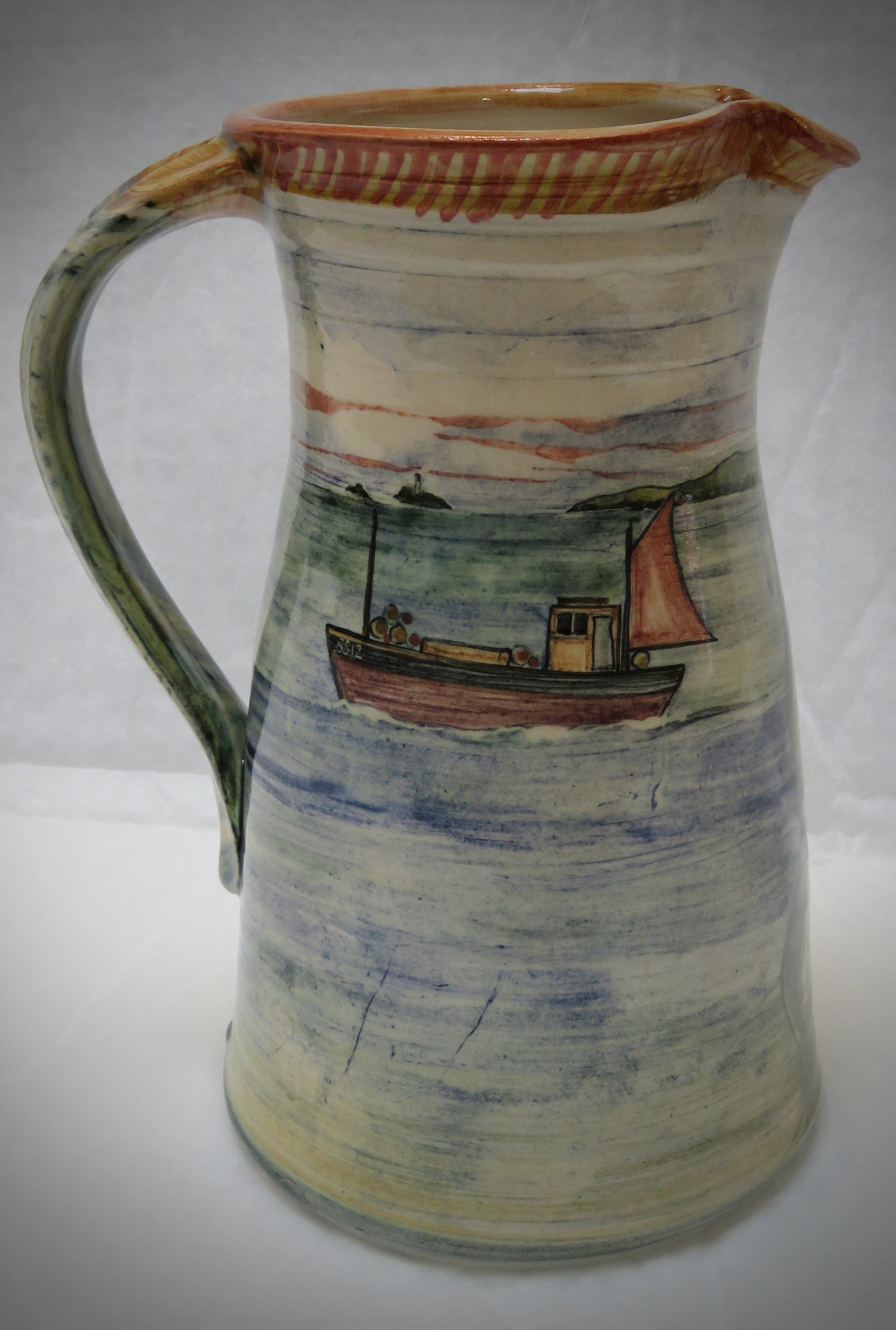 Decorated pottery jug, lighthouse 22 cm